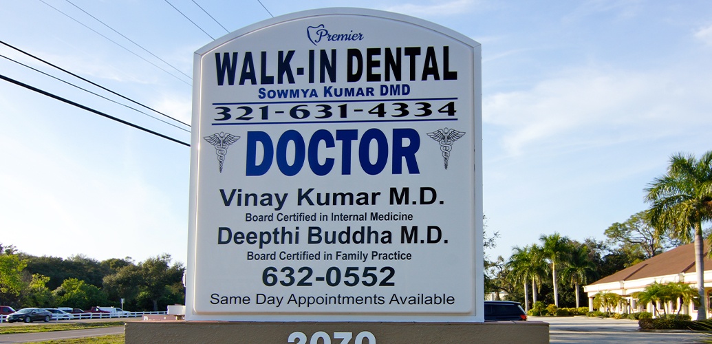Premier Walk-In Dental road sign