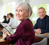 A happy and smiling senior businessman