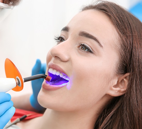 woman having cosmetic bonding done