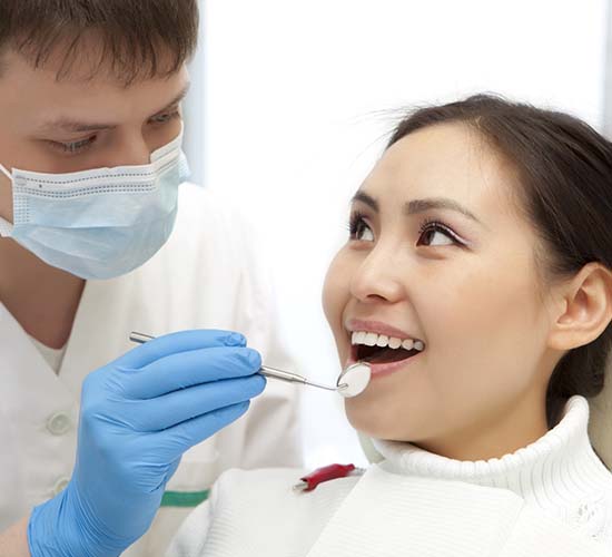 Patient visiting an emergency dentist in Rockledge for a checkup