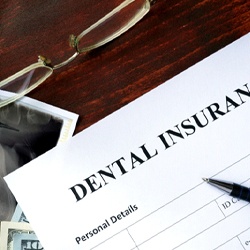 Paperwork representing dental insurance coverage for wisdom tooth extraction in Rockledge