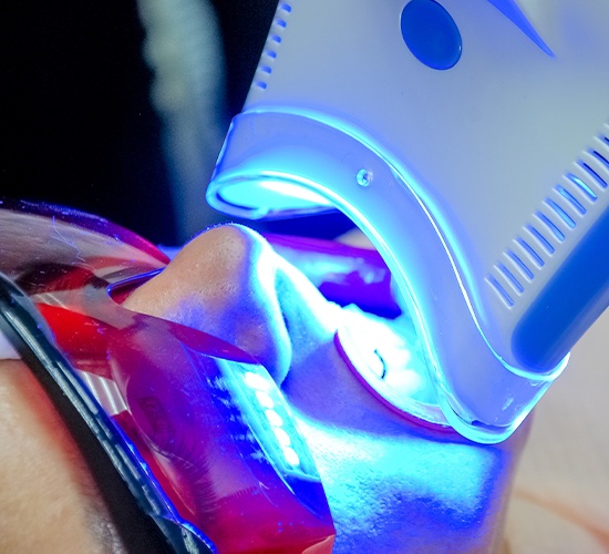 man having teeth whitening done