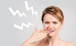 woman with tooth pain