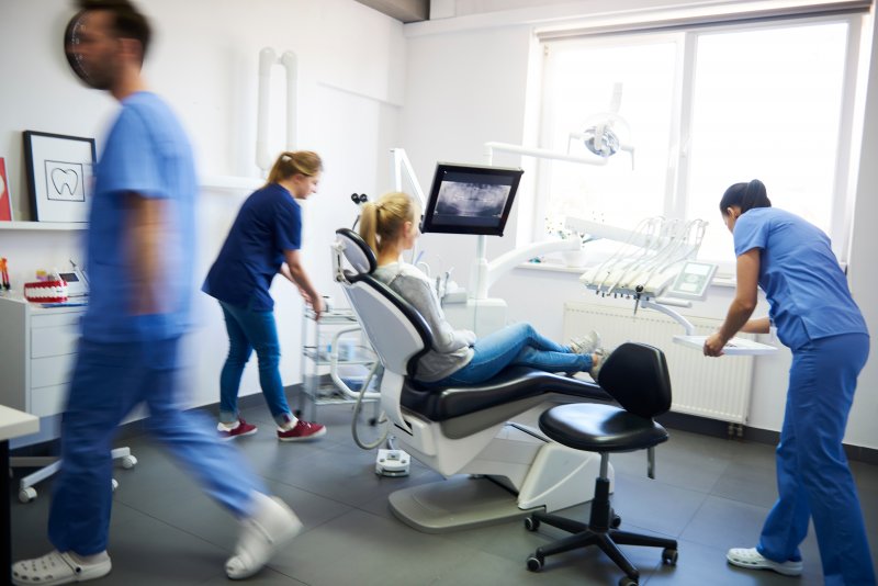 Dentists treating a dental emergency