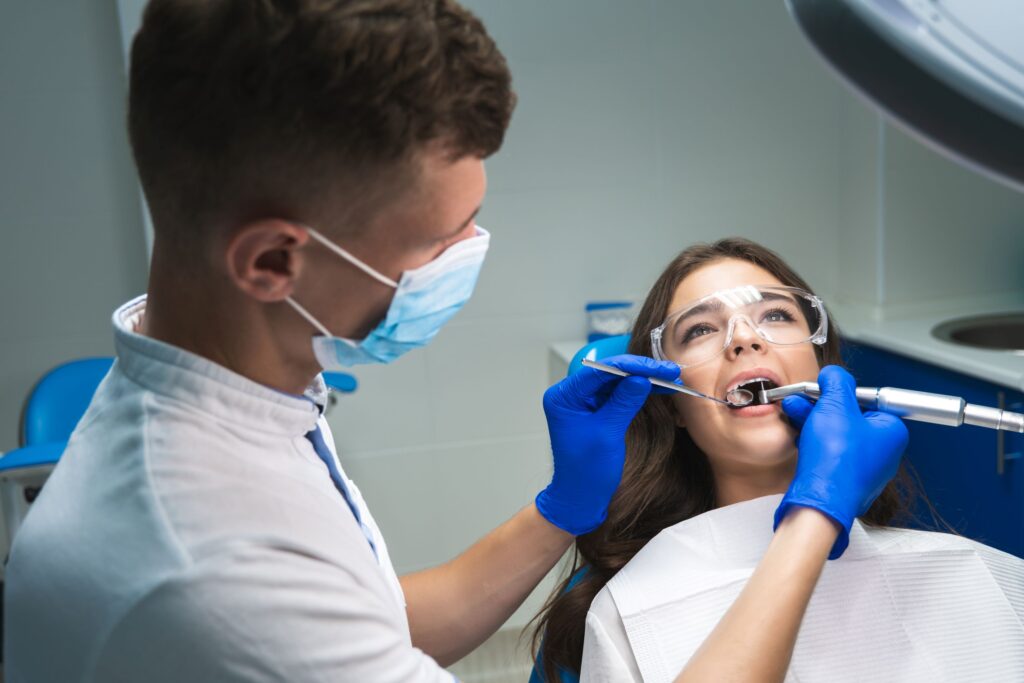 Woman in dental chair undergoing root canal